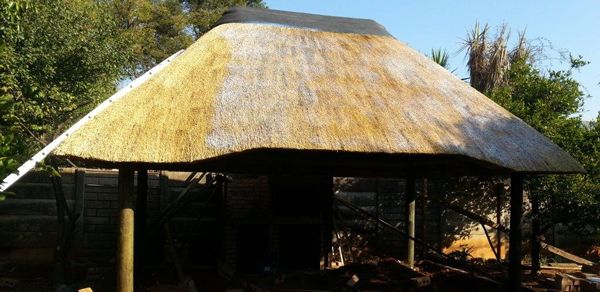 Thatched lodge roof treated with fire retardant